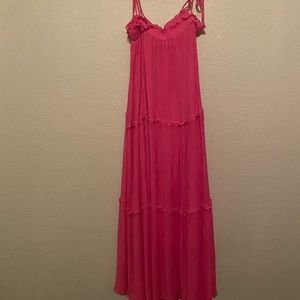 Pink strappy maxi dress.